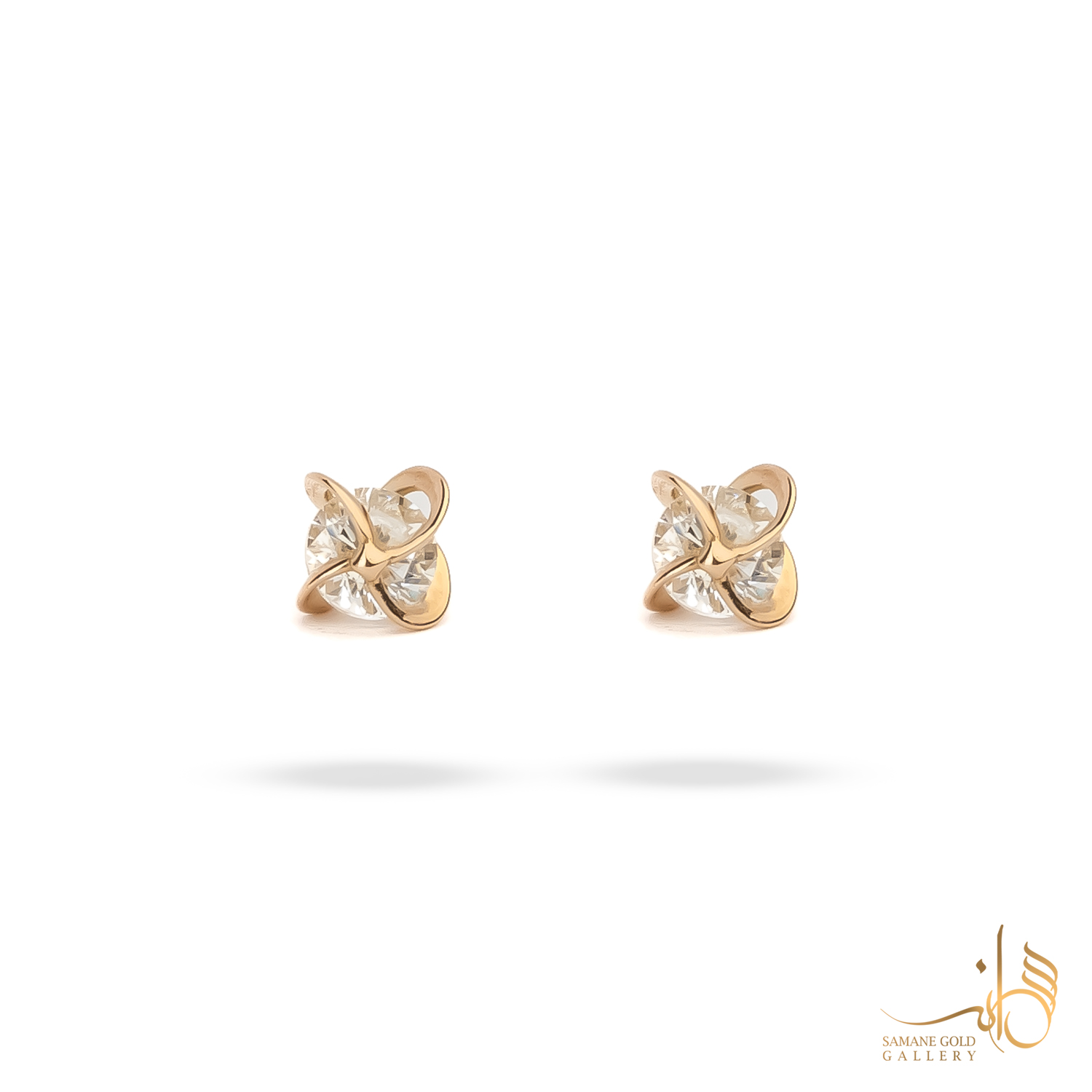 گوشواره طلا میخی گره نگین‌دار